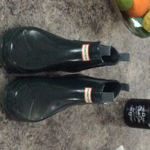 Dark green kids hunter rain boots.